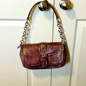 Ladies shoulder bag mauve coloured